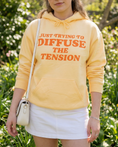Load image into Gallery viewer, Trying to Diffuse the Tension Premium Hoodie (L)