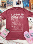 Load image into Gallery viewer, Cupboard Under the Stairs Support Group Garment Dyed Tee