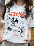 Load image into Gallery viewer, Care of Magical Creature Society Garment Dyed Tee
