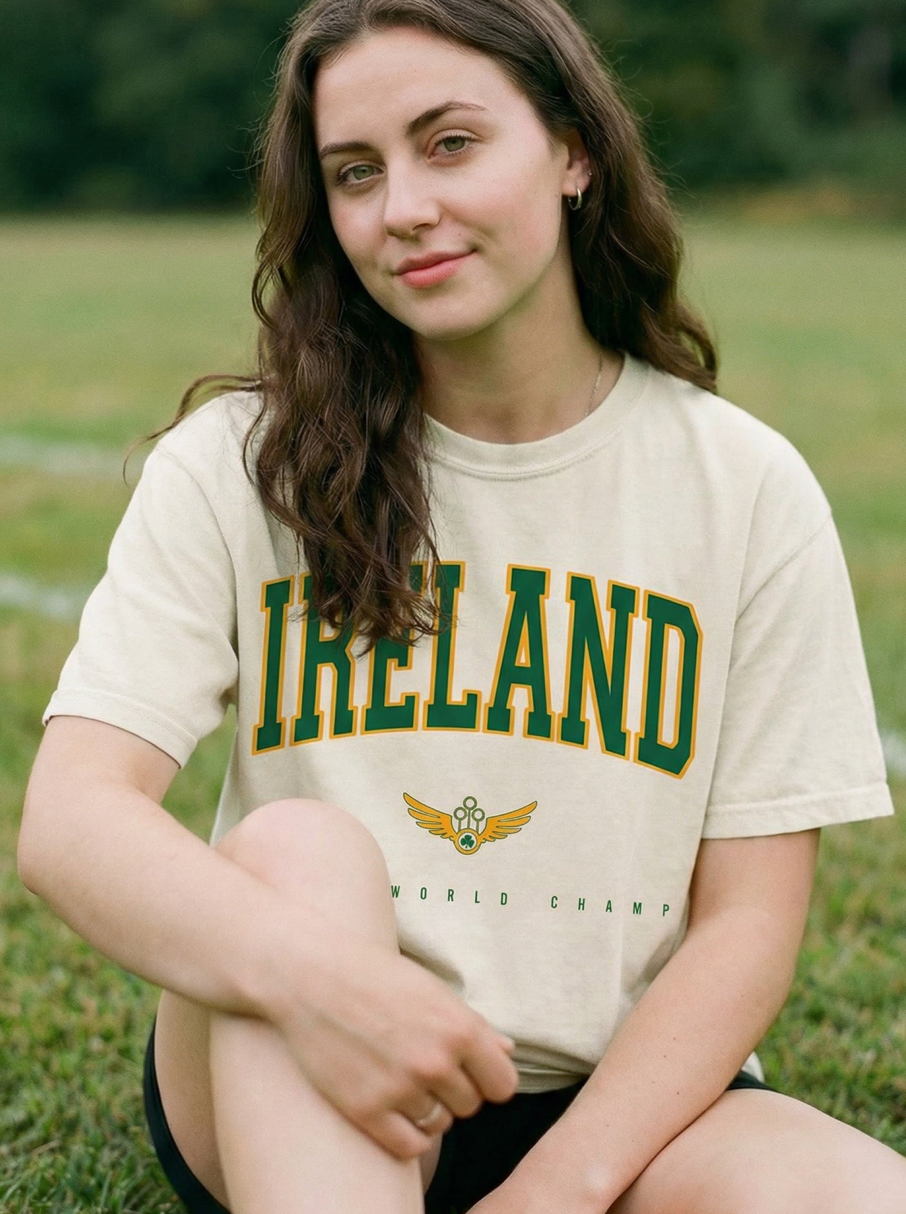 Ireland World Champion design with green and gold text, winged shamrock symbol -- garment-dyed tee by Aftercolor | wizarding graphic tee